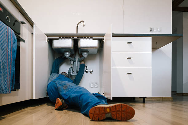 Professional Plumbing technician working in Malverne, NY